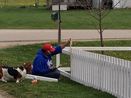 Papa building the garden fence | ASimpleHomestead.com