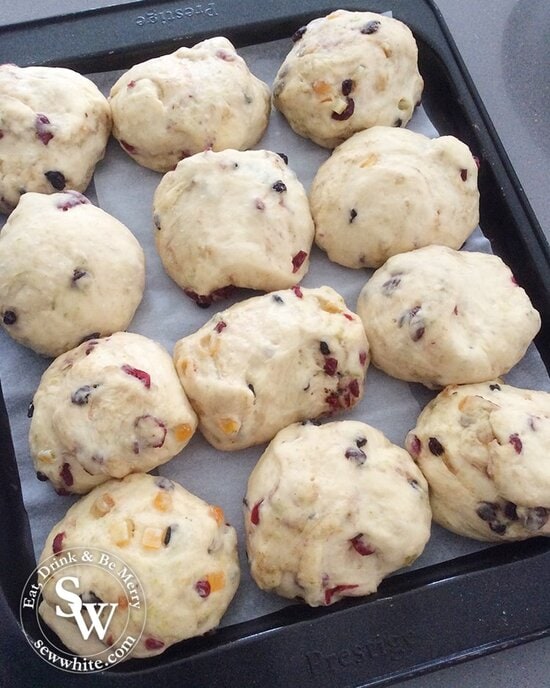 hot cross bun dough after it's prove studded with cranberries and lime