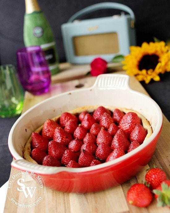 Golden pastry crust tart filled with strawberries baked in vanilla and balsamic vinegar. Recipe for Balsamic Vanilla Strawberry Tart.