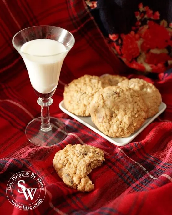 Cranberry and White Chocolate Cookies on a red tartan with a glass of milk