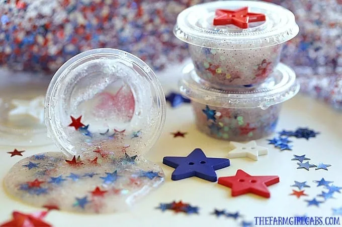 Looking for a fun red, white and blue craft idea to keep the kids busy at your July Fourth Celebration?This Patriotic Party Slime makes the perfect party favor. #slimerecipe #slime #4thofjulycraft