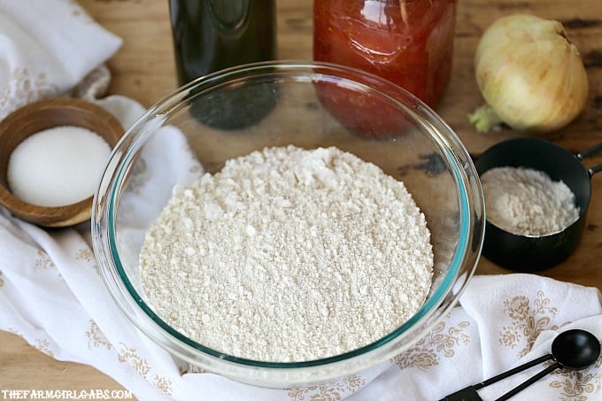 With a few simple ingredients, the Best Pizza Dough recipe is perfect for pizza night in your home!