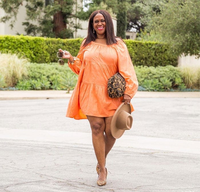 Julie in an orange dress | 40plusstyle.com