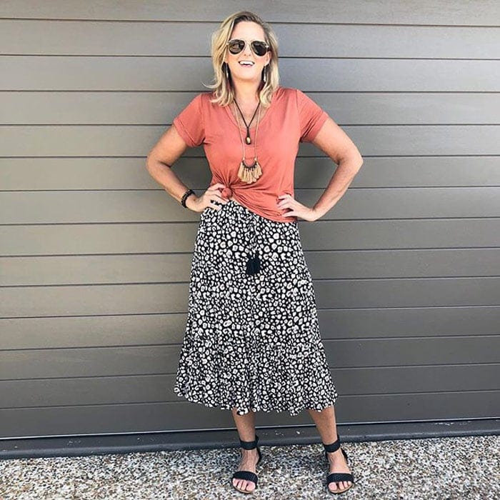 a knot t-shirt with a midi skirt | 40plusstyle.com