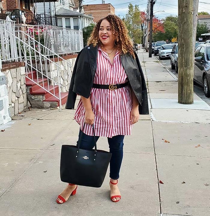 Stripe top worn with belt, jeans, moto jacket and sandals | 40plusstyle.com