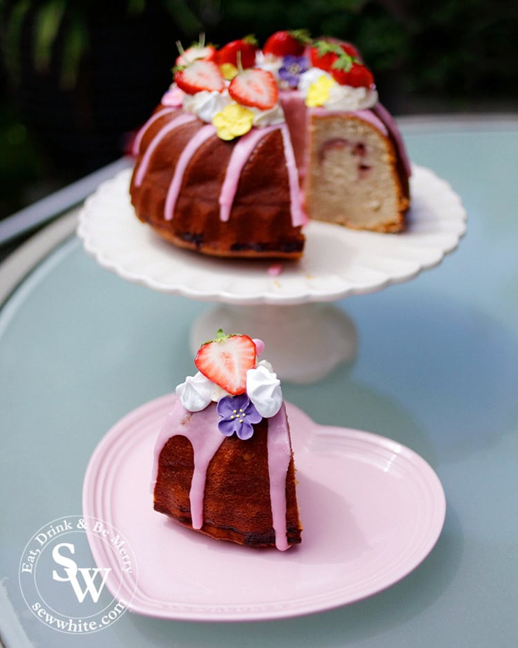 A slice of the Kugelhopf Strawberry Prosecco Cake showing the jam filling.