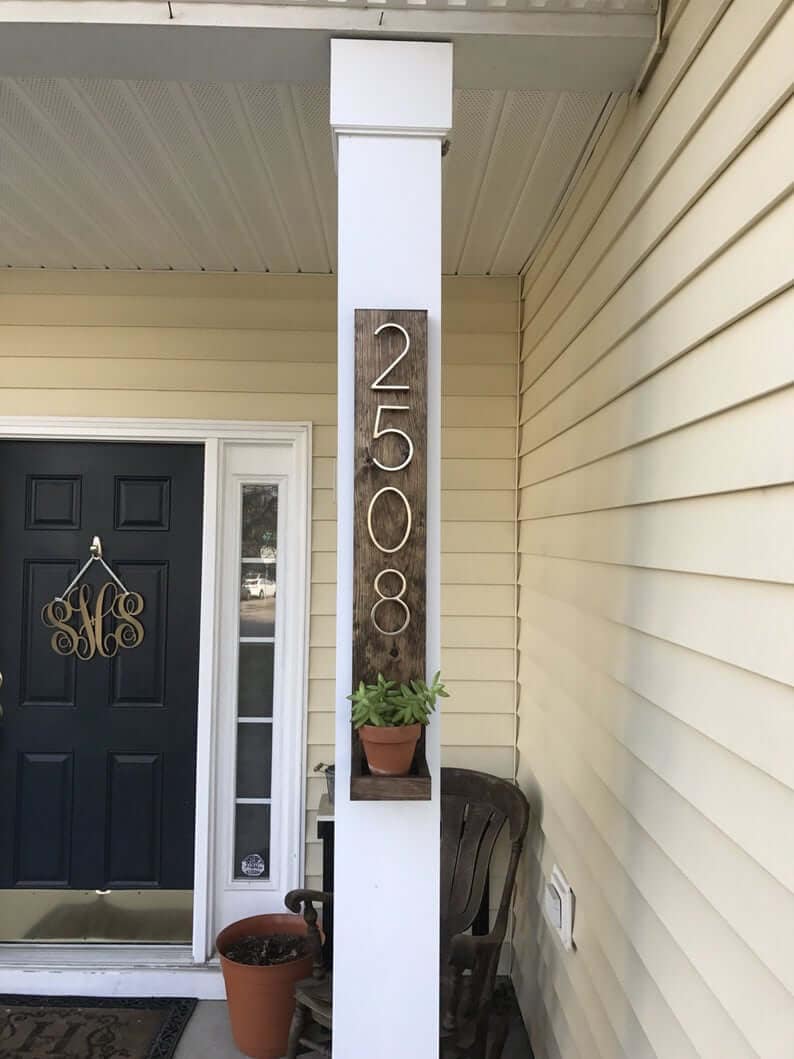 PORCH COLUMN MAKEOVER IDEAS WITH ADD HOUSE SIGN AND PLANTERS