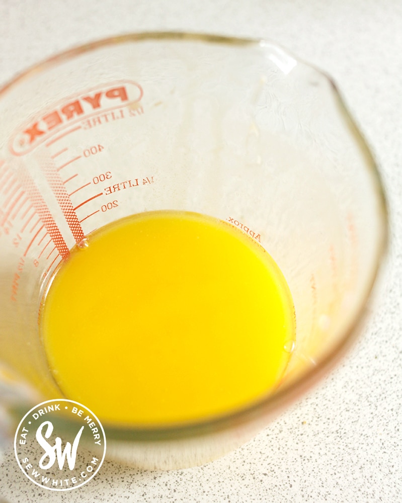 Melted butter in a pyrex jug