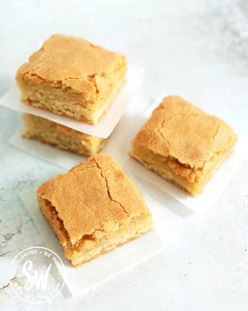 Blondie Recipe slices on greaseproof paper ready to serve