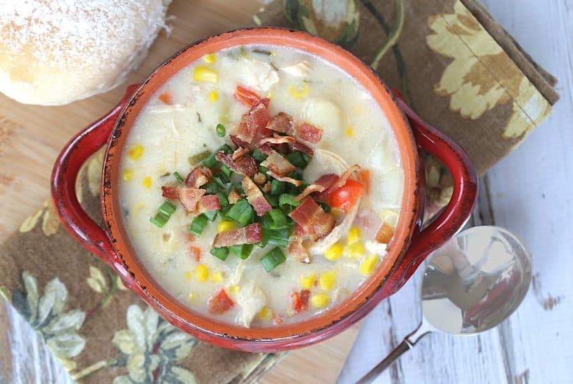 Warm up on a cold day with a bowl of this hearty Chicken Corn Chowder. This easy soup recipe is Loaded with chicken, corn, bacon, cheese, potatoes. This delicious chowder recipe is a winner! This soup recipe is easy to make and freezer-friendly, perfect for dinner any night of the week.