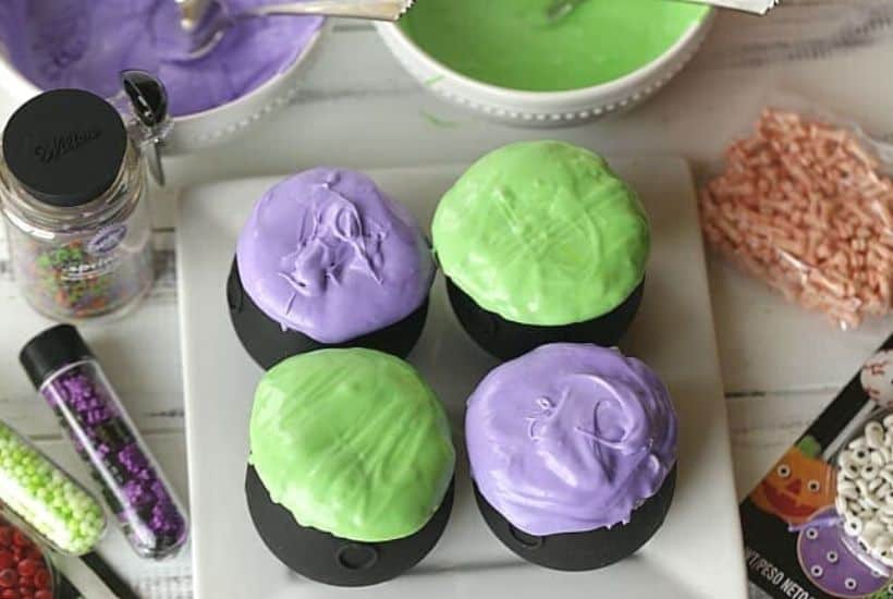 Double, double, toil and trouble. These Witches' Brew Cupcakes are the perfect Halloween treat. These bewitching cupcakes are perfect for a Halloween party. Save this fun Halloween cupcake recipe so you can make it for your family.