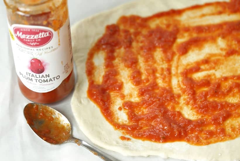 When you want to change up your normal pizza routine, try this easy Pepperoni Pizza Pinwheels recipe instead. They are a perfect snack or meal option. #Ad #LivenUpYourMeal #Mezzetta #MezzettaSauce #KetoLife #PizzaRecipe #Pinwheels