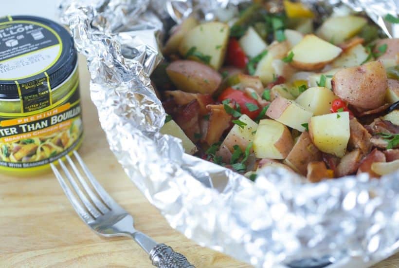 Fire up the grill and make this Potato And Bacon Foil Packets recipe. This easy grilled side dish is a perfect summer recipe or camping recipe. And it has bacon in it! #foilpackets #potatoandbaconfoilpacket #campingrecipe #grillingrecipe #Ad #BTBGrillingRecipes #IC