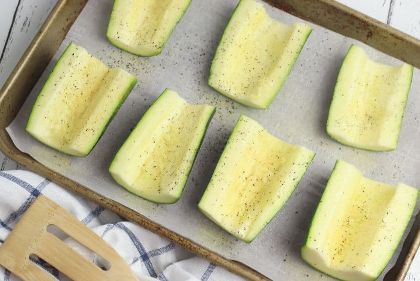This Stuffed Pizza Zucchini Boats recipe is a perfect low carb dinner option or side dish. This easy zucchini recipe is perfect for summer.