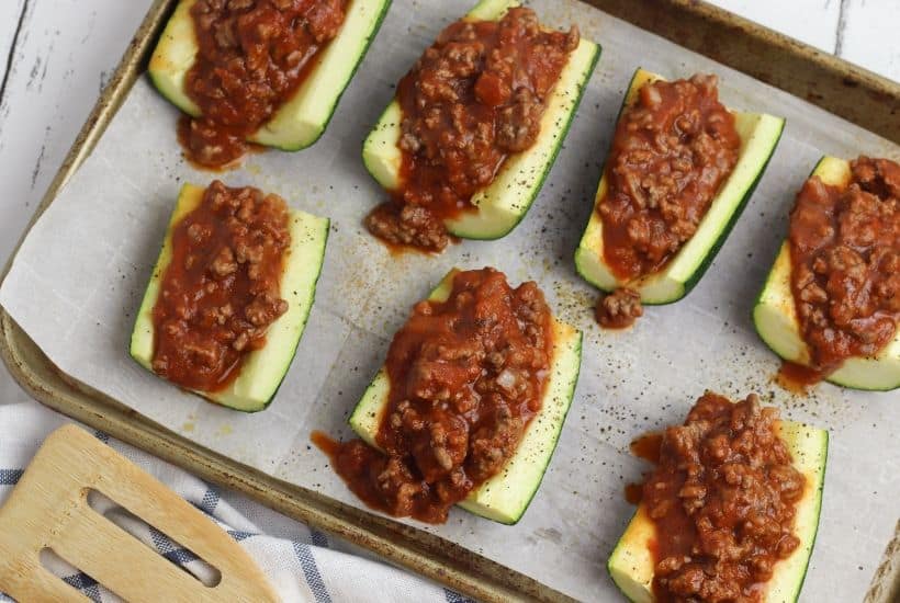 This Stuffed Pizza Zucchini Boats recipe is a perfect low carb dinner option or side dish. This easy zucchini recipe is perfect for summer.