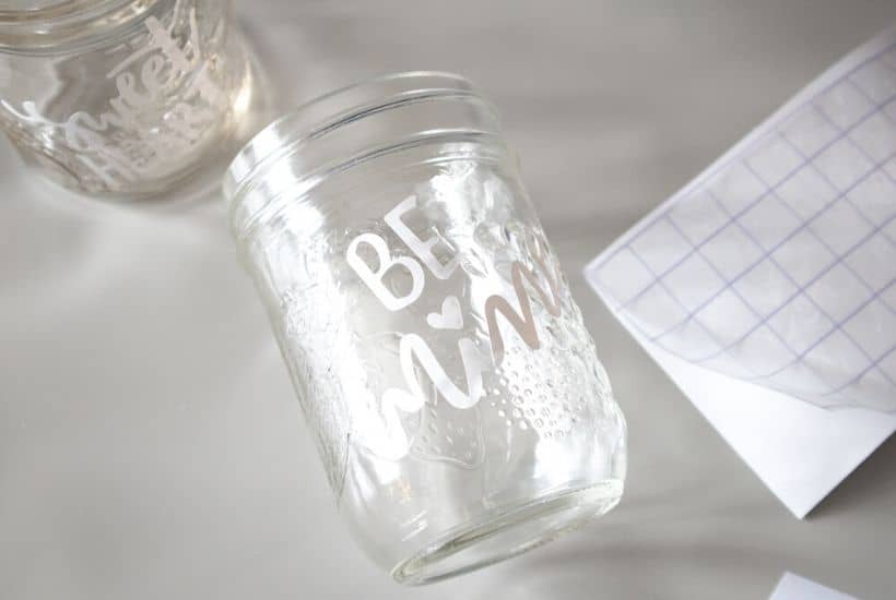 Share some sweetness this Valentine's Day. These Cricut Valentine Candy Mason Jars are a great gift idea for teachers, family and friends. This is an easy Valentine Craft idea to make with your Cricut Machine. This Cricut craft project is a perfect way to celebrate Valentine's Day. #cricutcraft #masonjars #valentinesday #valentinecraft