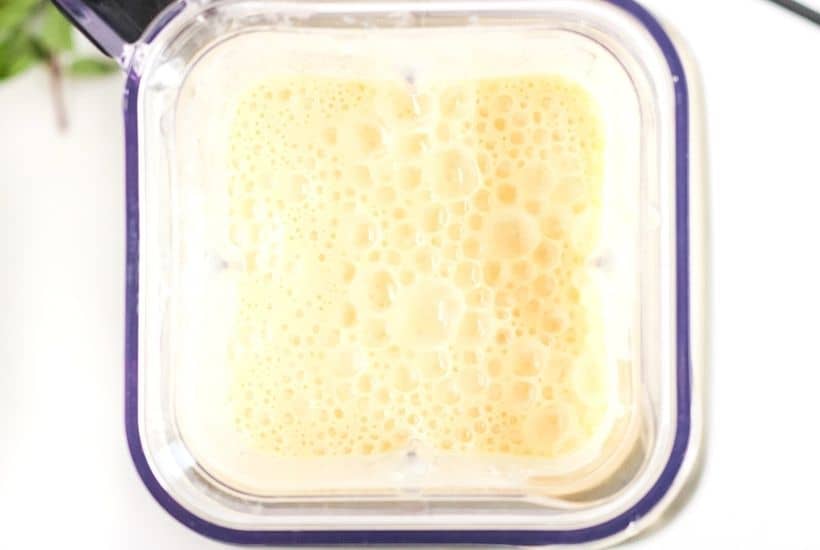 Orange Julius Popsicles are creamy, smooth, and full of orange flavor. If you love an orange creamsicle, you are going to love this variation of the classic frozen treat. This Copycat Orange Julius Pops Recipe is perfect for a hot summer day. Try this homemade orange creamsicle recipe today.