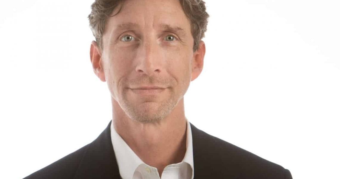 Corporate headshot of man in blazer by Stonetree Creative Corporate headshot of man in blazer by Stonetree Creative