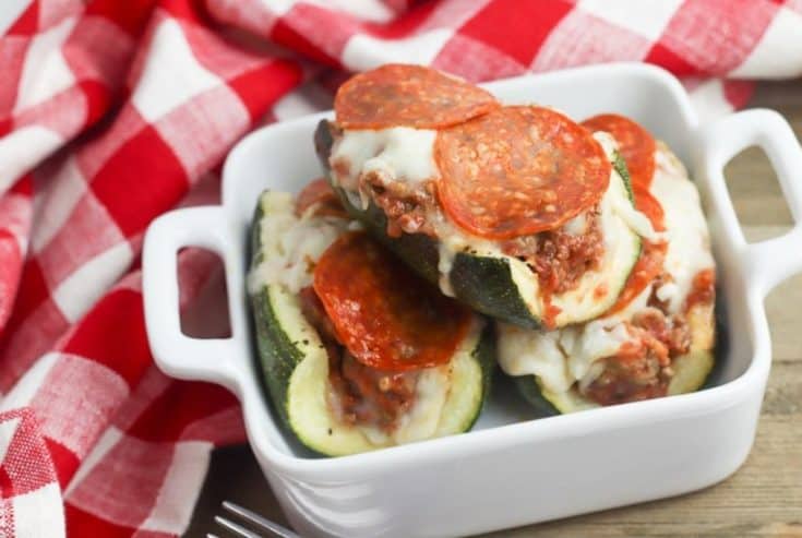This Stuffed Pizza Zucchini Boats recipe is a perfect low carb dinner option or side dish. This easy zucchini recipe is perfect for summer.