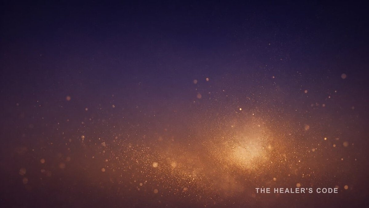 Gold light particles falling away through dark indigo twilight haze