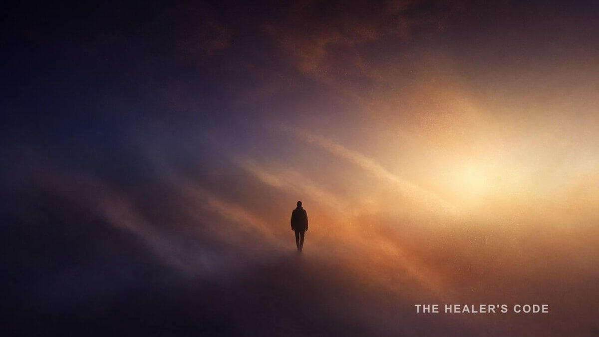 A silhouetted walker stepping into gold light in indigo space