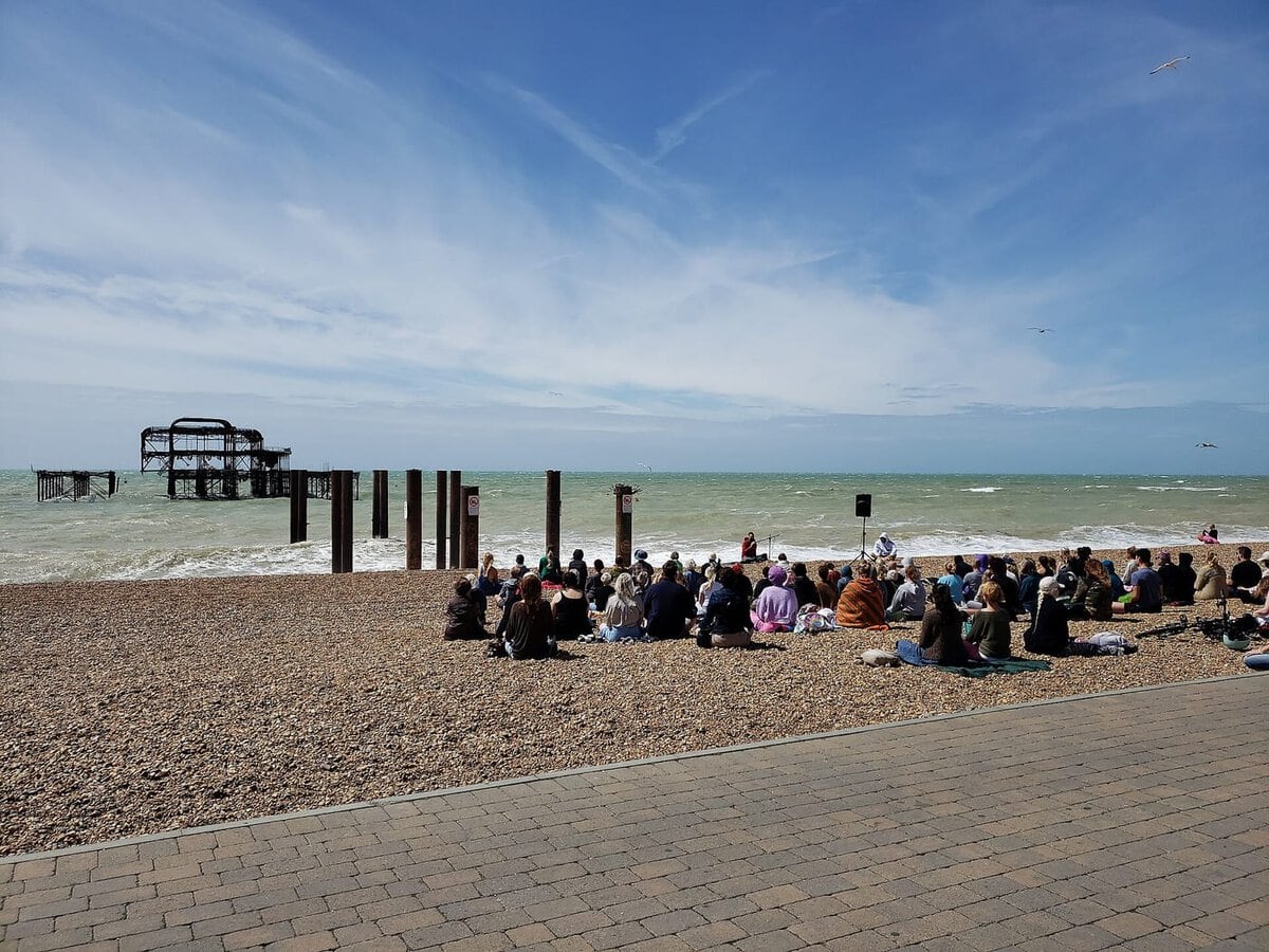A group meditation on Brighton beach