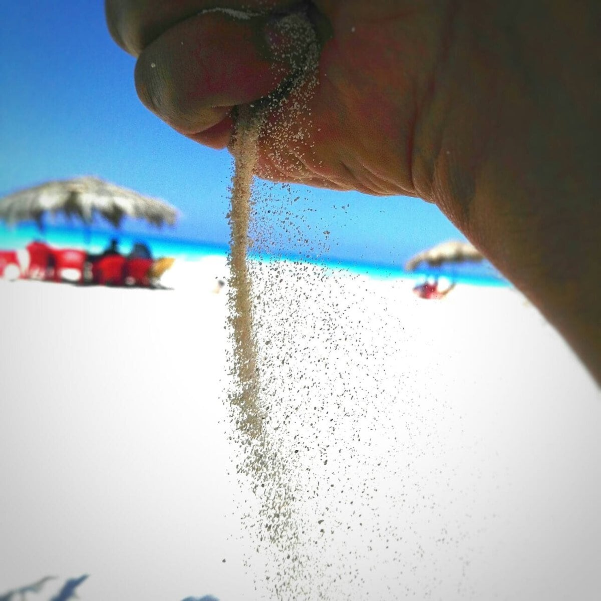 Sand falling from an open hand