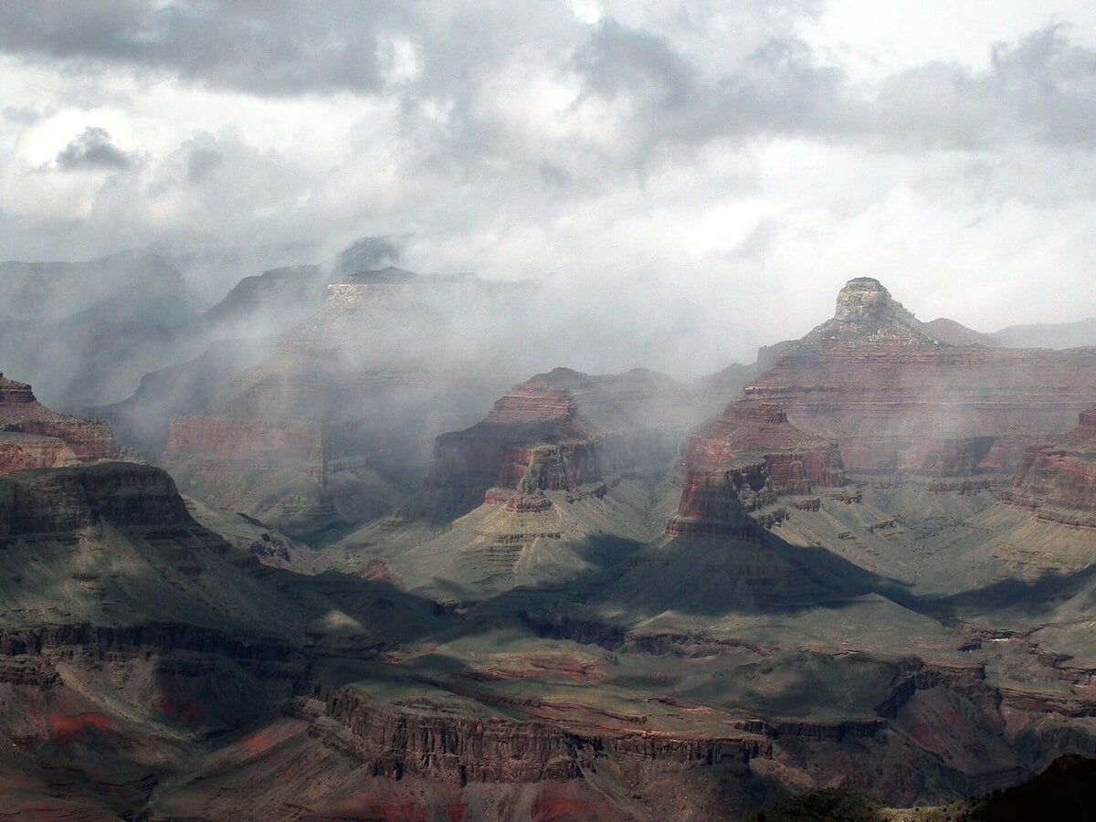 Grand Canyon landscape with rain clouds, weather system moving over the same landscape