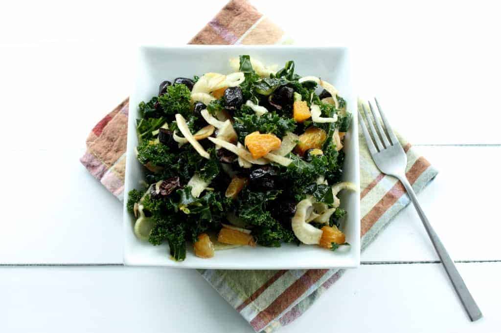 This Winter Kale Salad, is simple, poppin' with flavor and easy to prepare. Perfect for getting a healthy start on your new year!