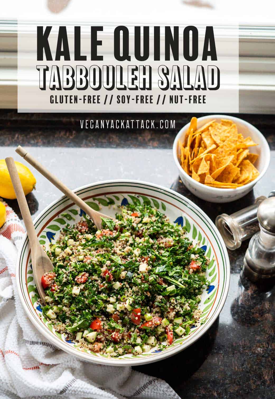 Image of salad in a large ceramic bowl, on granite countertop, with text reading "kale quinoa tabbouleh salad"