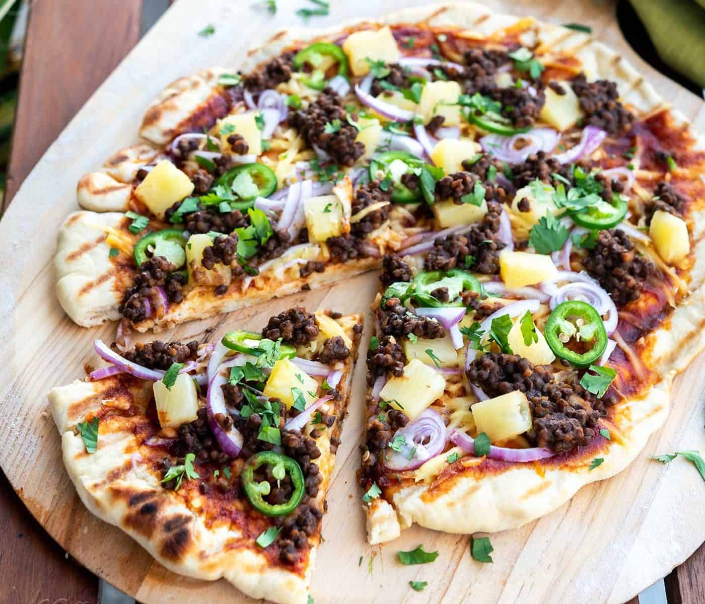No matter the time of year, pizza always hits the spot! What better way to get your BBQ and pie cravings covered, than with this Grilled BBQ Lentil Pizza?