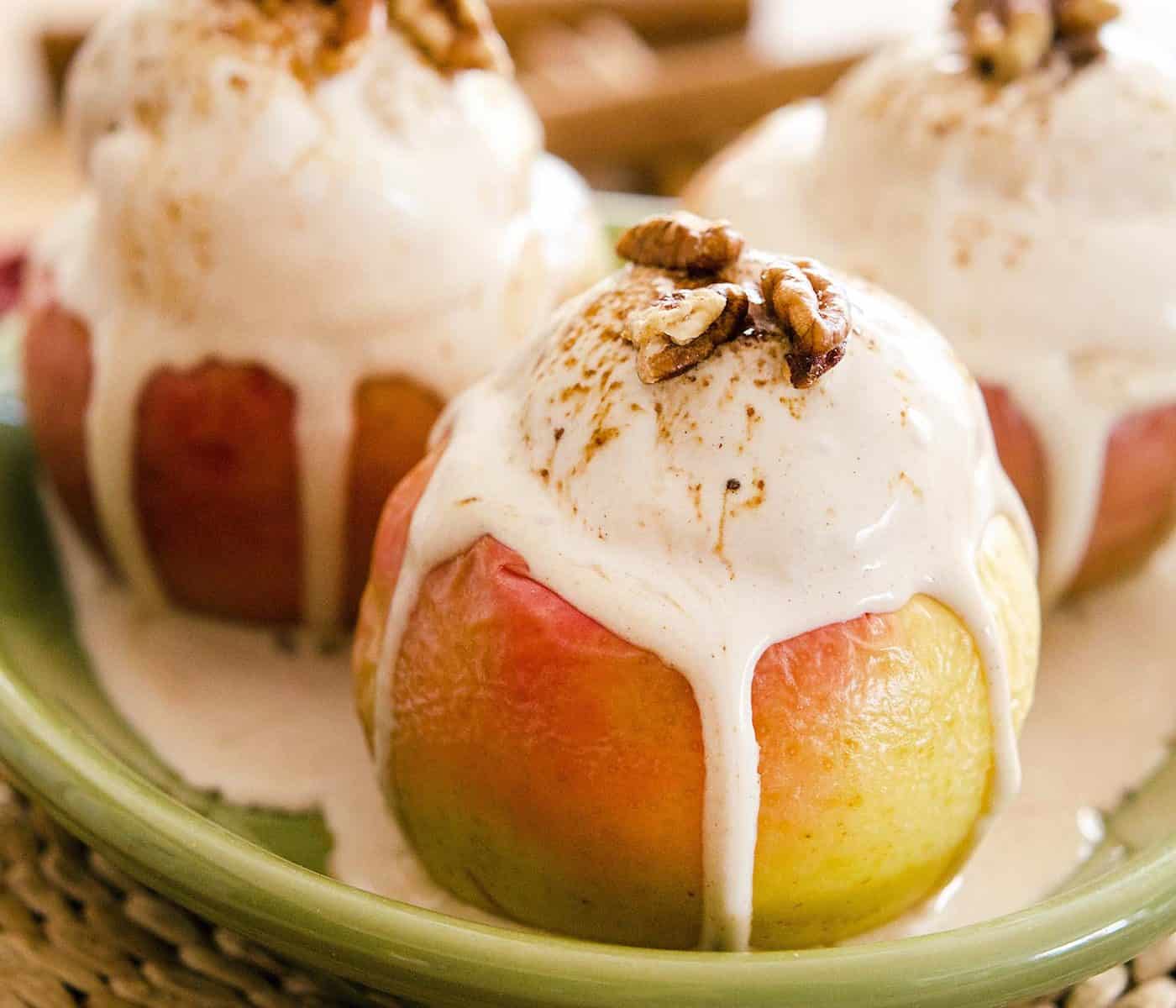 This recipe for Baked Apple Cinnamon Sundaes is downright delicious and full of autumnal flavors. It involves roasted apples (mostly) whole and whipping up homemade vegan ice cream! Plus, there's a no-churn option for those with no ice cream maker. #Vegan #dairyfree #glutenfree #fallrecipes #soyfree