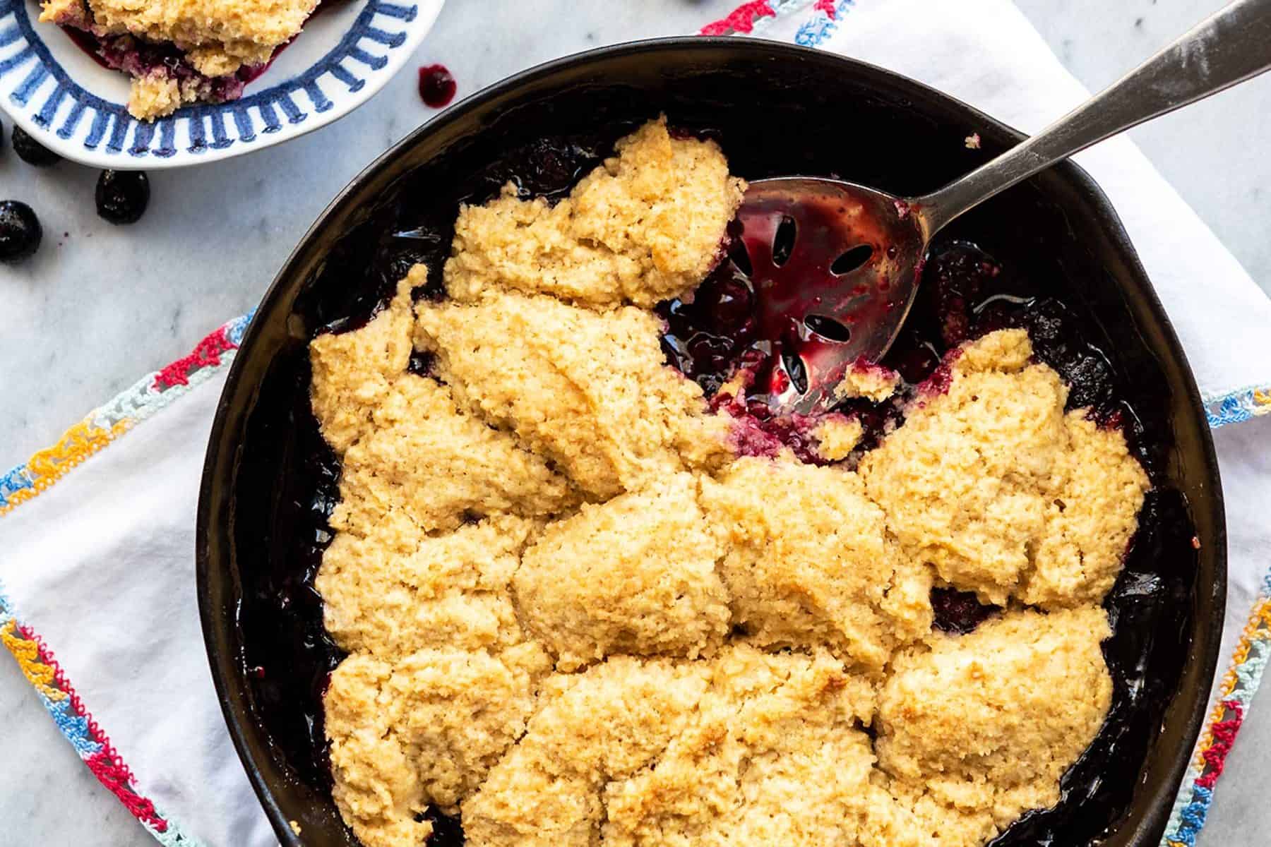 No need to heat up your kitchen with the oven this summer, make this Grilled Blackberry Cobbler. A fluffy biscuit topping, fresh berries, and super delicious; plus, vegan!