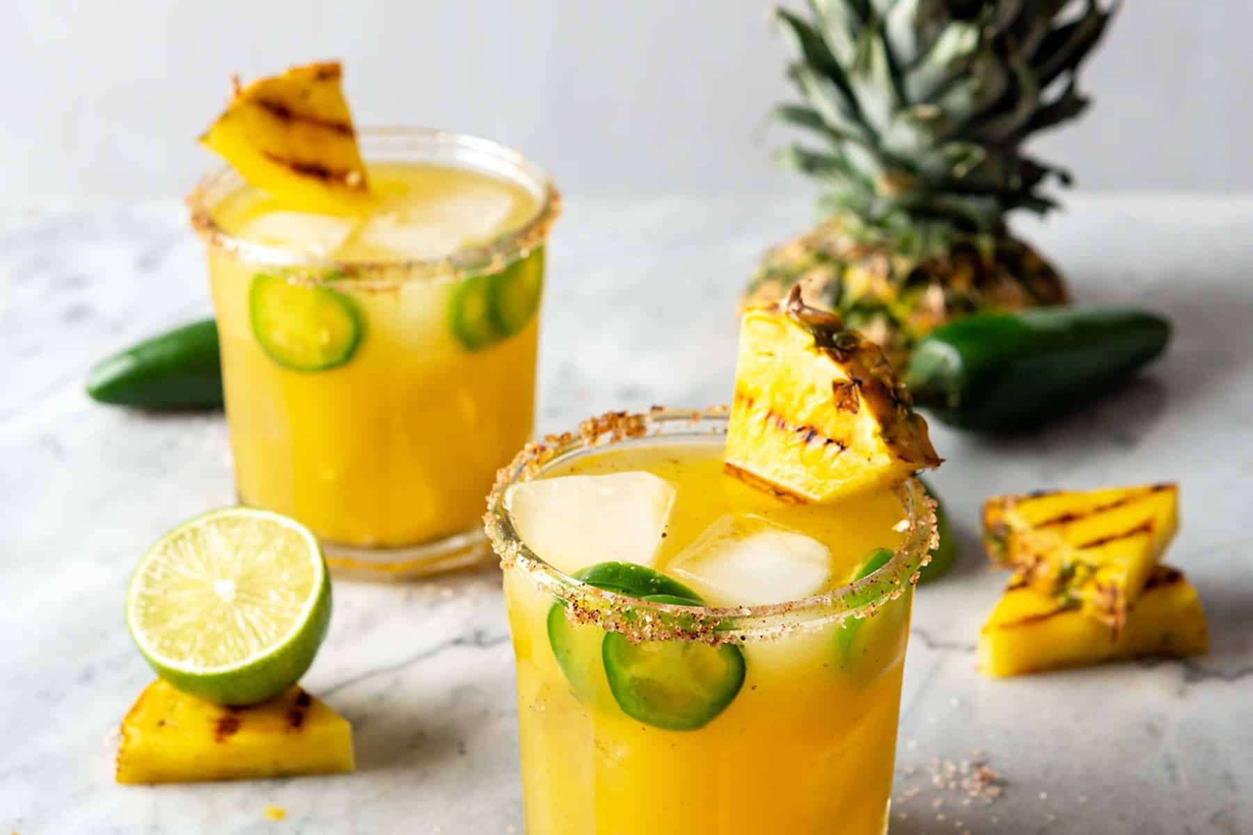 These Charred Pineapple Jalapeño Margaritas are better than any of their predecessors and unique in their own way! Try out this recipe to cool down, while also bringing the heat. #cocktails #margaritas #pineapple #recipe #jalapeno