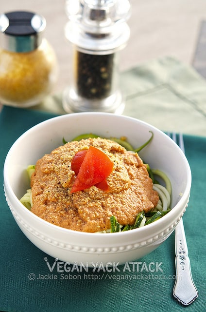 Raw Creamy Tomato Basil Pasta: A delectably light summer meal of zucchini noodles entangled with a raw, creamy tomato basil sauce.