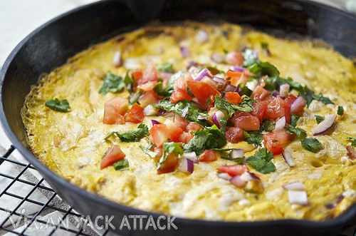A delicious Mexican Tofu Frittata for any brunch! Filled with fajita veggies and vegan cheese. Yum!