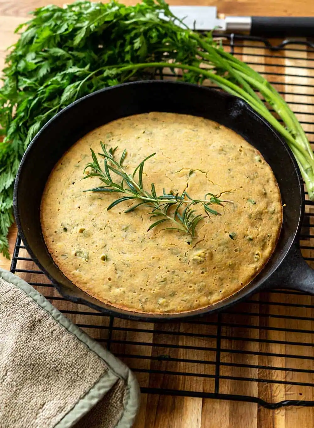 Image of baked cornbread on a cooling rack