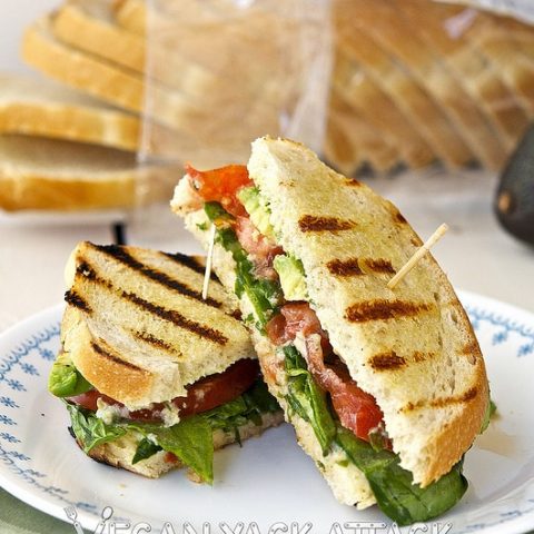 A Grilled Sourdough Sammie with tangy jalapeño lime aioli and fresh summer produce stacked inside.