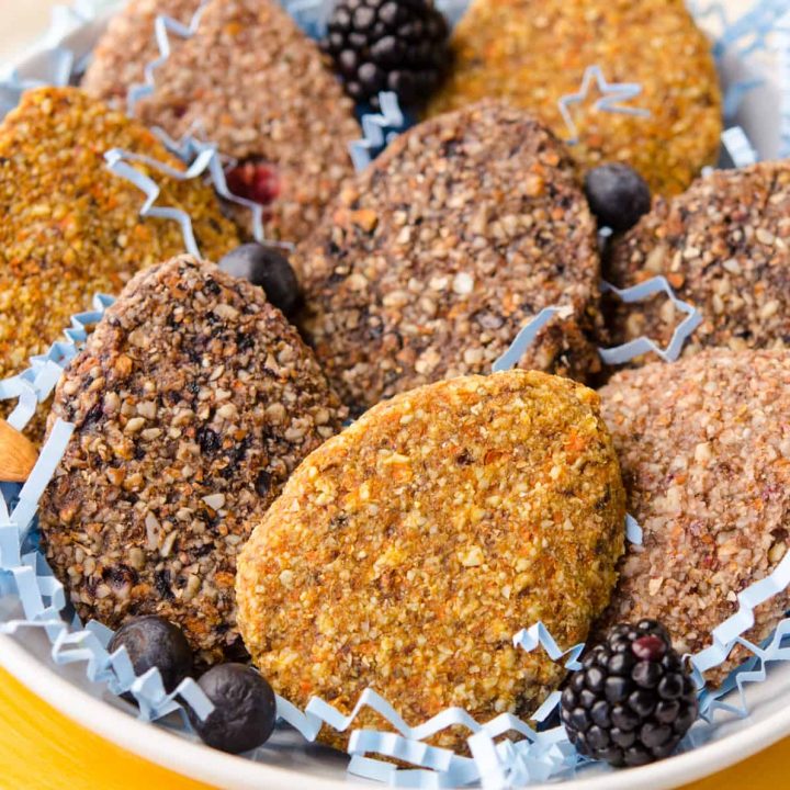 Colorful and healthy Raw Easter Cookies, these cookies have flavors like Strawberry Mint, Berry Vanilla and Carrot Cake! #vegan #plantbased