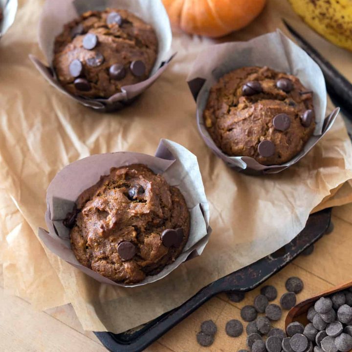 Super moist pumpkin banana nut muffins with sweet chocolate chips. Perfect for fall! Dairy-free, egg-free, soy-free and vegan.