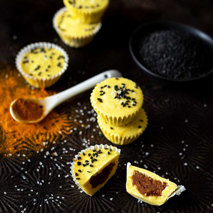 Need a unique, fall treat? These vegan White Chocolate Pumpkin Peanut Butter Cups are incredible, and easier to make than you might think! #dairyfree #glutenfree #veganyackattack