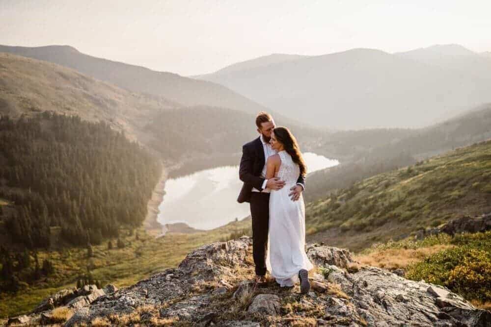 Bride and Groom Hugging Best Places to Elope in Colorado