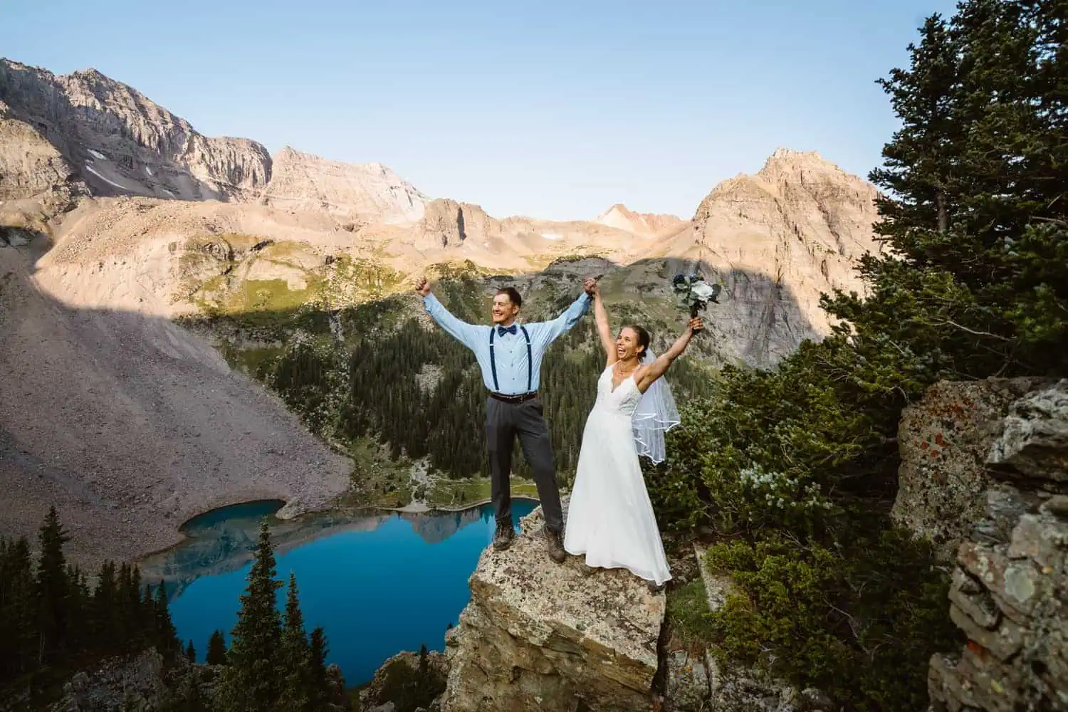 Bride and Groom Celebrating Colorado Mountain Elopement Packages