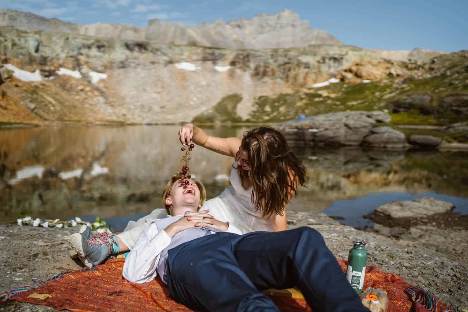 Bride and Groom Eating Ouray Colorado Elopement