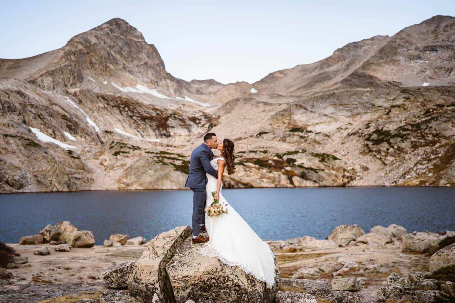 Bride and Groom Kissing Colorado Mountain Elopement Packages