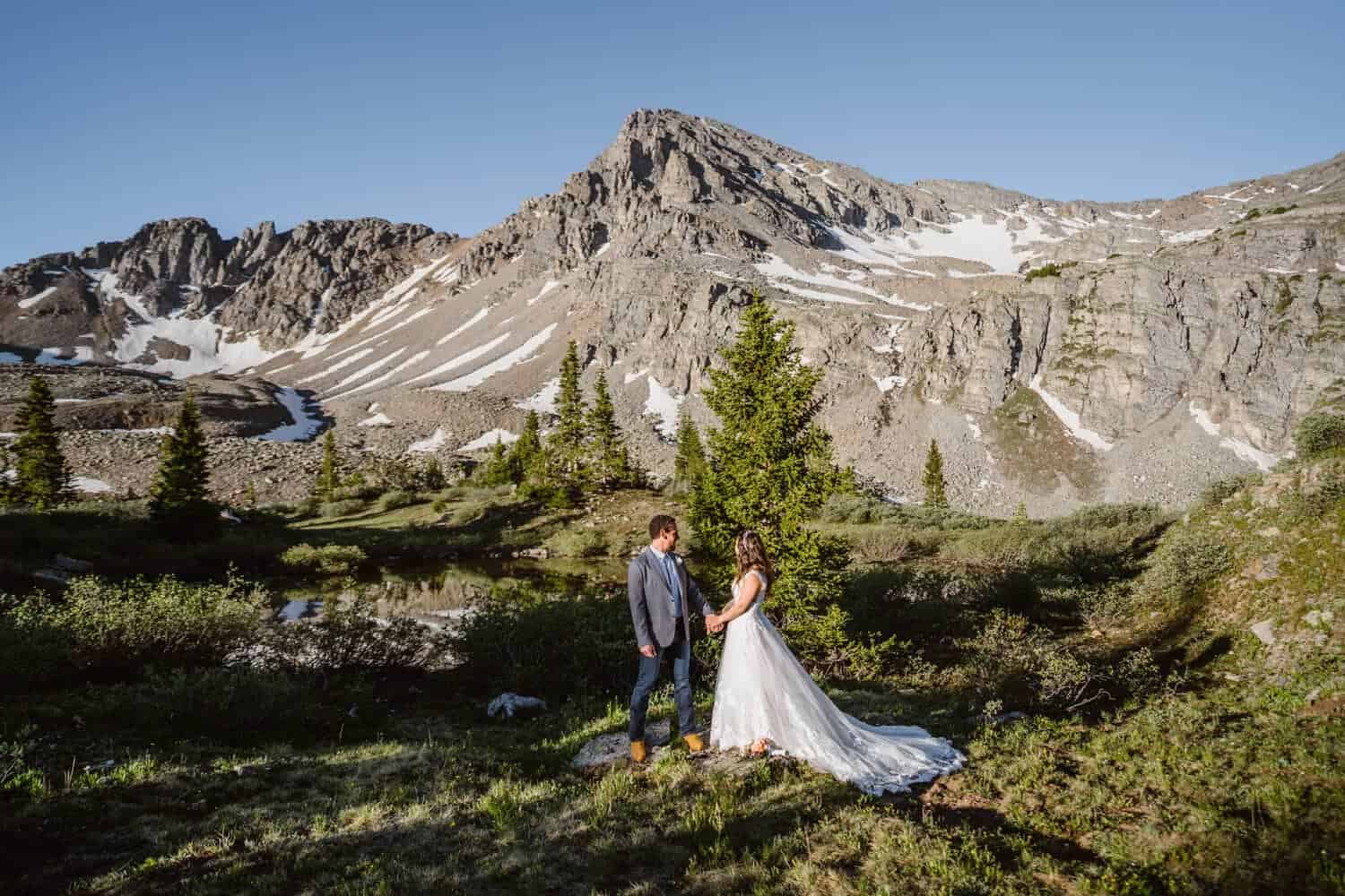 Bride and Groom Holding Hands Colorado Mountain Elopement Packages
