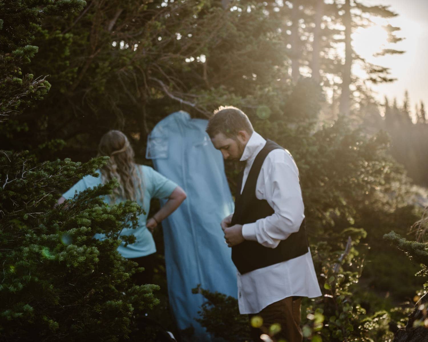 Bride and Groom changing at Colorado Adventure Elopement