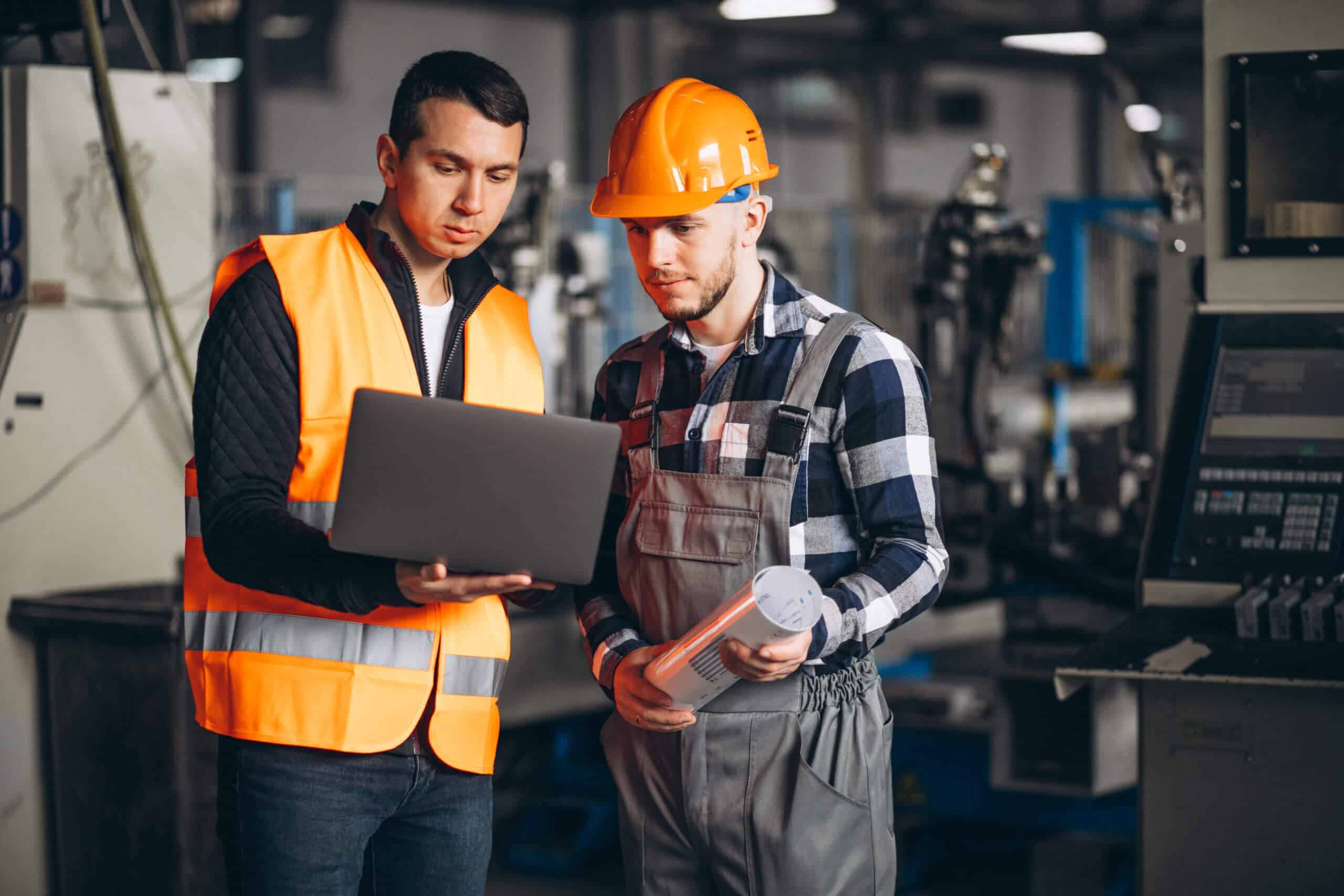 two-colleagues-at-a-factory-scaled-2 Automating in finance