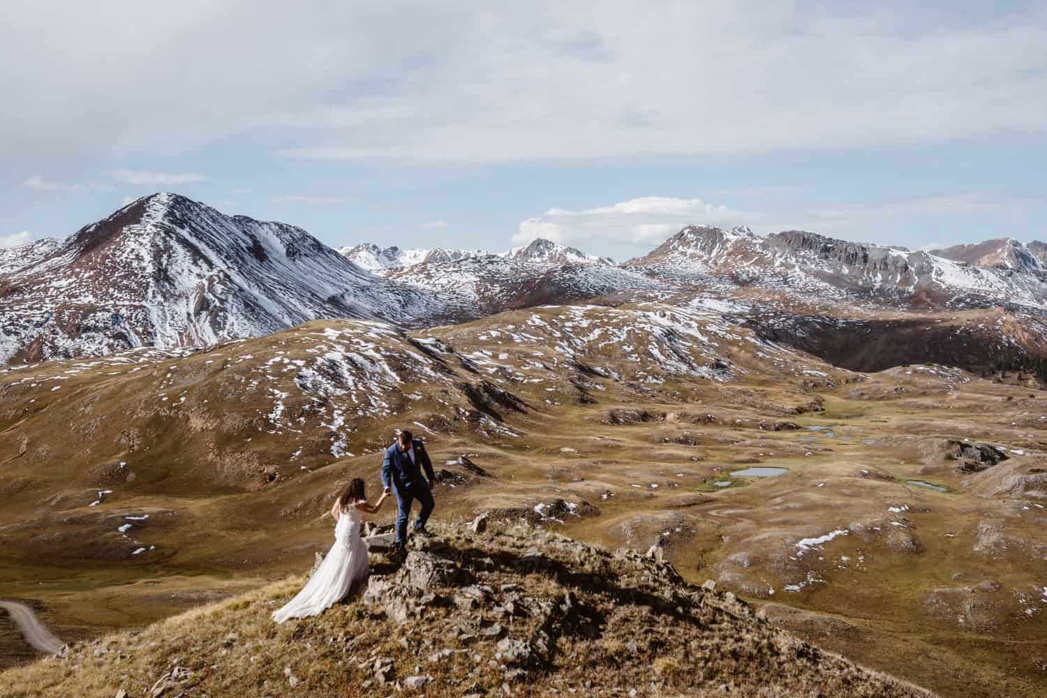 Bride and Groom Hiking at Silverton, CO Elopement