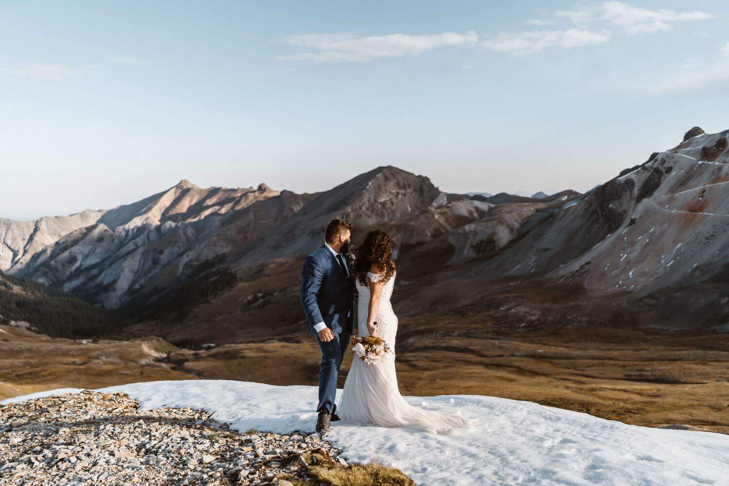 Bride and Groom Looking Off at Silverton, CO Elopement